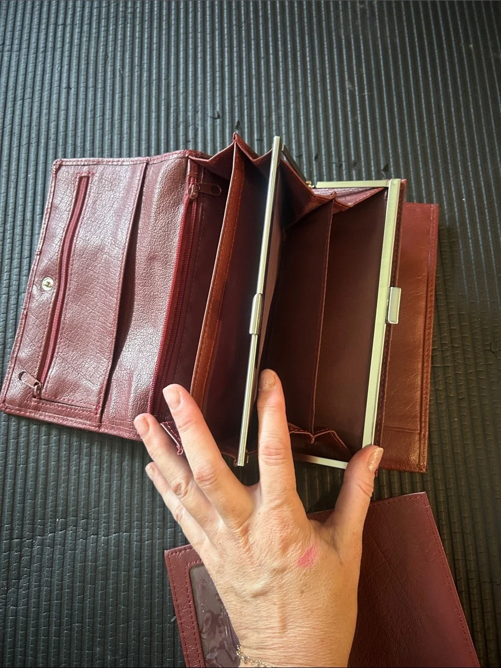 Wilson’s leather, maroon Leather trifold, wallet with Gold Accent